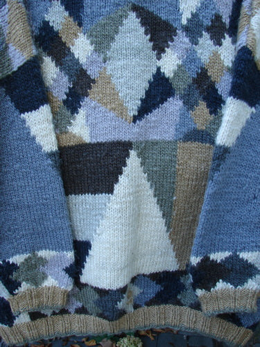 Tara Handknits Diamond Button Oversized Cardigan Geometric Naturals OSFA, showcasing a detailed argyle pattern with ribbed cuffs and hem, crafted by the Hot Knots Sisters for Bluefishfinder.com.