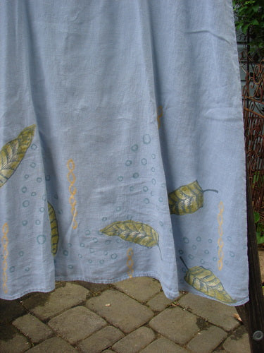 1999 Handkerchief Linen Sunbeam Dress Leaf Water Size 1, featuring a full-length sweeping skirt, empire waist seam, and sectional panels with a sweet leaf theme. Ideal for summer sweltering days.