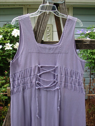 2000 Eiffel Dress Spaceship Twilight Size 1 on a hanger, featuring a gathered upper, curved empire waistline, triangular neckline insert, and sectional panels, emphasizing the sweeping line shape.