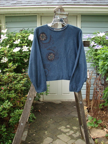 1997 Cotton Cashmere Crop Pullover Star Wheel Marled Blueprint Size 3 displayed on a wooden ladder, showcasing its boxy shape, drop shoulders, and detailed star wheel design.
