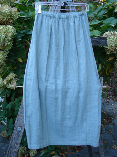 2000 Cross Dye Linen Contour Skirt Unpainted Meadow Size 0 features a full-length, vertically paneled design with an elastic waistband, showcased outdoors, epitomizing Bluefishfinder.com's vintage and expressive fashion ethos.