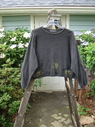 1997 Cotton Cashmere Crop Pullover Column Marled Granite Size 3, displayed on a wooden ladder, highlighting its thick-knit texture, boxy shape, drop shoulders, and ribbed neckline.