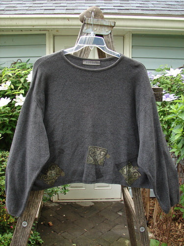 1997 Cotton Cashmere Crop Pullover Column Marled Granite Size 3 displayed on a hanger, showcasing its boxy shape, drop shoulders, ribbed hemline, and rolled ribbed neckline.