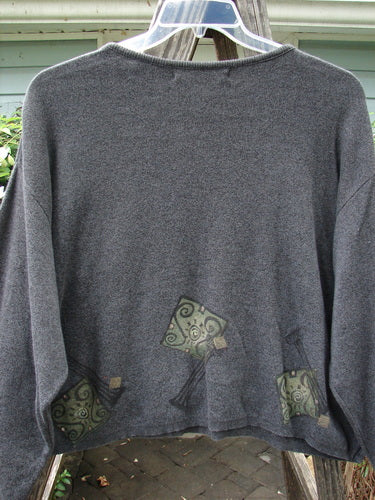 1997 Cotton Cashmere Crop Pullover Column Marled Granite Size 3, featuring a grey sweater with a green design, boxy shape, drop shoulders, ribbed hemline, and rolled neckline.