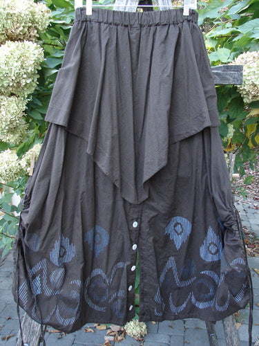 Barclay Batiste Split Button Pant Skirt Celtic Mocha Size 0, featuring a bohemian-style design with buttoned tiers and drawstring accents, displayed outdoors, embodying Bluefishfinder.com's vintage, expressive ethos.