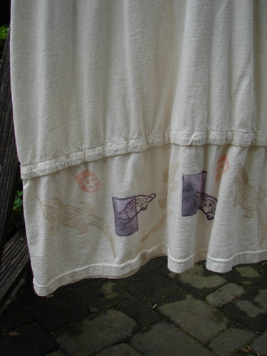 2001 T Snap Dress Game Pieces Fizz Size 1, organic cotton, longer A-line shape, three-quarter sleeves, front painted triangular pockets, snap tape hem, and V neckline, showcasing vintage Blue Fish Clothing style.