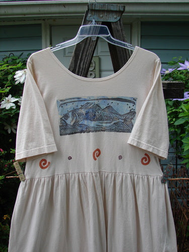 1996 Simple Dress Fish Birch Bark Size 2: White short-sleeved dress with a blue fish stamp, deeper rounded neckline, drop empire waist, gathered waistline fabric, and full sweeping skirt.