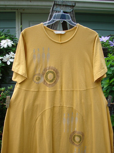 1998 Croquet Dress Lawn Games Lemonade Size 2 displayed on a swinger, featuring a shallow rolled neckline, vertical rounded panels, slight empire waist seam, and unique front and back inserts.