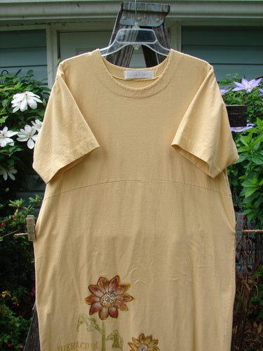 1998 Botanicals Calla Dress Tall Sunflower Sundial Dress Size 1 displayed on a hanger, featuring a sunflower pattern and a softly folded neckline, in perfect condition from the Spring Botanicals Collection.