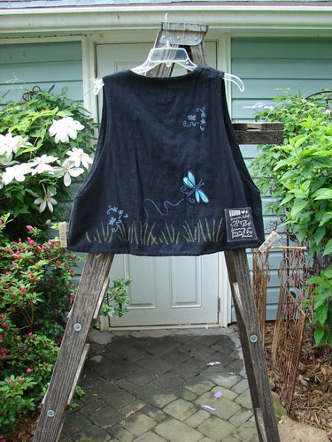 1999 Textured Linen Sunfish Vest in Raven with dragonfly field theme, featuring an A-lined shape, deeper arm openings, three pearly buttons, and a Blue Fish patch.