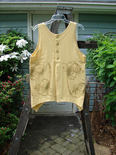 1998 Botanicals Aster Vest LVIII Sundial Altered Size 1 displayed on a hanger, featuring organic cotton material with wavy shell buttons, deep neckline, and unique front and rear vents.