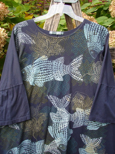 Barclay Short Sleeved Pop Top Mosaic Fish Ridge OSFA features a unique fish motif on medium-weight organic cotton, with a rounded hemline and drop shoulders, embodying vintage Blue Fish Clothing's creative spirit.