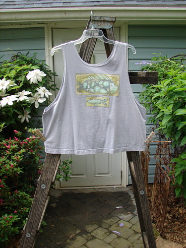 1999 Crop Tank Top Fish Mix Blue Bell Size 1 on a wooden ladder, showcasing its colorful fish-themed design and wide, boxy shape.