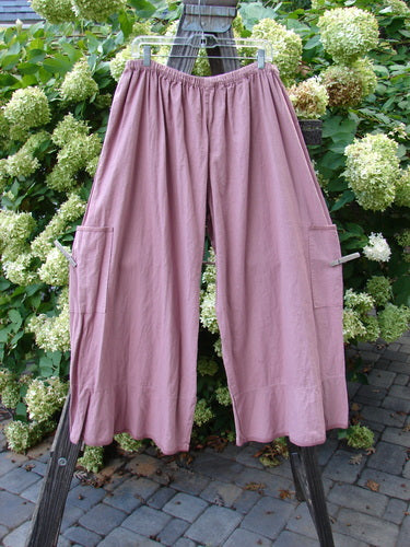 Barclay Linen Spring Flutter Pant Unpainted Rosey Peony Size 2 displayed on a rack, showcasing sectional panels, lower side drop pockets, and a full elastic waistline.