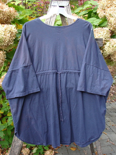 Barclay Short Sleeved Pop Top Mosaic Fish Ridge OSFA: A loose-fitting navy tunic with elbow-length sleeves, round neckline, drawstring waist, and rounded hemline, showcasing a layered mosaic fish theme.