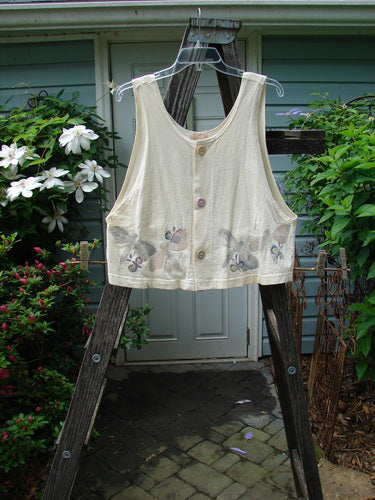 1999 Pinwheel Vest All Butterflies Dust Size 0 displayed on a wooden ladder, featuring butterfly-themed paint, porcelain buttons, flared hemline, deeper arm openings, and Blue Fish patch.