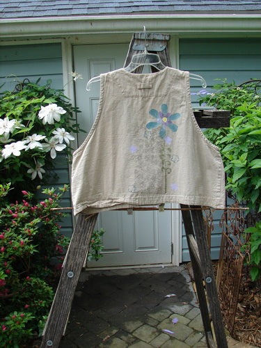 2000 Parachute Cross Stitch Vest Sunrise Floral Dove Size 0 draped on a wooden ladder, showcasing a deep V neckline, four metal buttons, and bright floral paint.