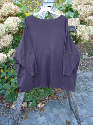 Barclay NWT Modern Square Top Metallic Village Loam Ogo OSFA, displayed on a rustic ladder, showcases dolman shoulders and a rounded neckline, highlighting its artisanal, creative design in alignment with Bluefishfinder.com’s vintage ethos.