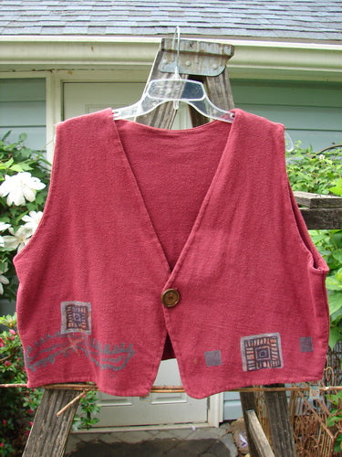 1995 Reprocessed Jazz Vest Vintage Car Hollyberry Altered Size 2, featuring a bright blue fish patch, single button closure, deep V-neck, and contrasting hems, displayed on a swinging hanger.