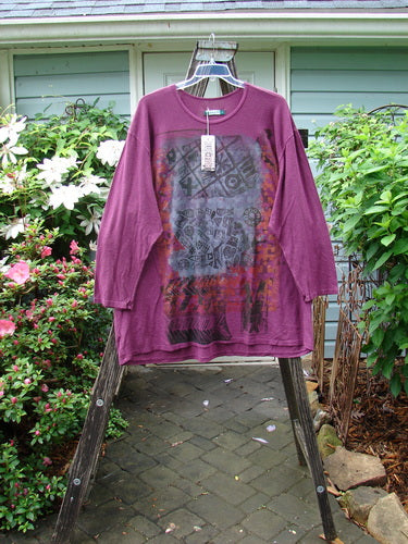 Barclay NWT Hemp Cotton Long Sleeved Studio Tee Knick Knack Tyrian Berry Size 2 displayed on a hanger, showcasing its generous shape, rounded neckline, and wide sleeves.