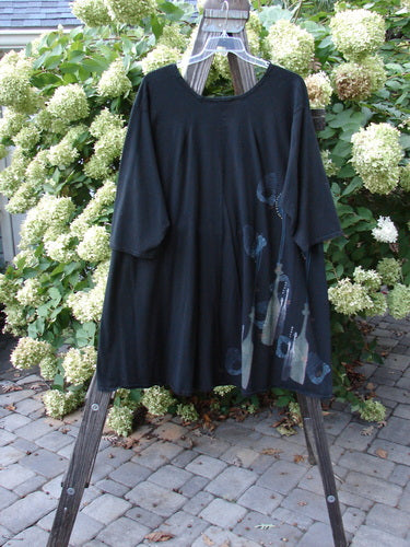 Barclay Hi Low Tunic Top Tall Neck Bottle Black Altered Size 2 on a wooden stand, featuring a rounded neckline, varying hemline, A-line shape, and three-quarter sleeves.