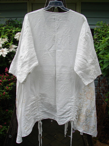 Barclay Linen Venetian Vented Tunic Dress with three-quarter sleeves on a clothesline, showcasing soft side floral white design, size 2.