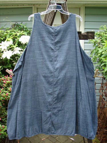 Barclay Lightweight Linen Pinafore Shift in Unpainted Blue Denim Stripe, Size 2, hanging on a line, showcasing its airy, vintage-inspired design from BlueFishFinder.