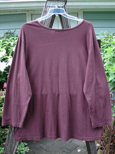 Barclay Long Sleeved Tee with a Spin Shell pattern, deep burgundy, size 3, displayed on a hanger. Features a wider boat neckline, A-line shape, and cozy long sleeves.