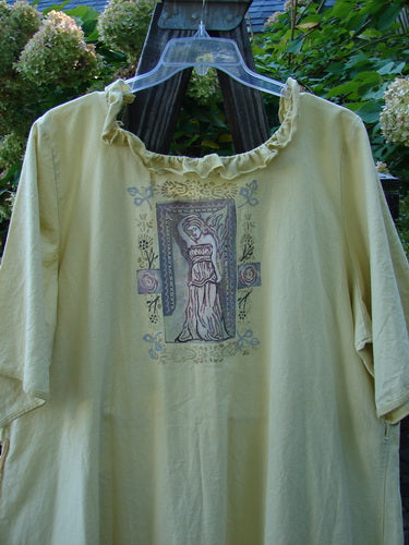 Barclay Linen Duet Sunrise Dress with Roman Goddess theme, featuring a curly neckline, vertical pleats, front pockets, and floral patterns. Ideal for summer, in a baby doll tunic style.