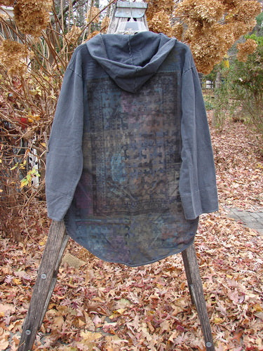 Barclay NWT Favorite Pocket Hoodie Primitive Pony Block Shadow Size 0 displayed outdoors, featuring a faded charcoal hue, unique puzzle-piece graphic on the back, cozy hood, and oversized buttons, capturing Bluefishfinder.com's vintage aesthetic.