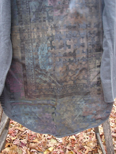 Barclay NWT Favorite Pocket Hoodie Primitive Pony Block Shadow Size 0, draped outdoors on a bench. Features include a cozy hoodie, oversized buttons, and primitive pony paint on a semi-sheer, pixelated print fabric.