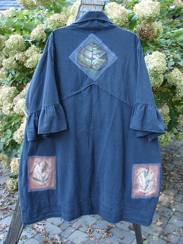 Barclay PMU Patched Twill Decora Brushed Flutter Coat Fall Leaf Navy Size 2, featuring a deep V-neckline, flutter sleeves, and leaf-themed patches, with a swingy hemline and large pockets.