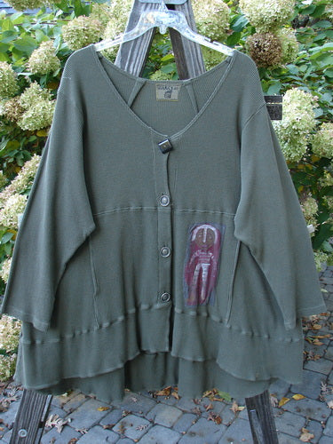 Barclay Patched Thermal Touring Cardigan Lucky Guy Pond Green OSFA featuring a unique flared hem, deep V neck, mixed vintage buttons, draw cord back, drop shoulders, and kangaroo style pocket.