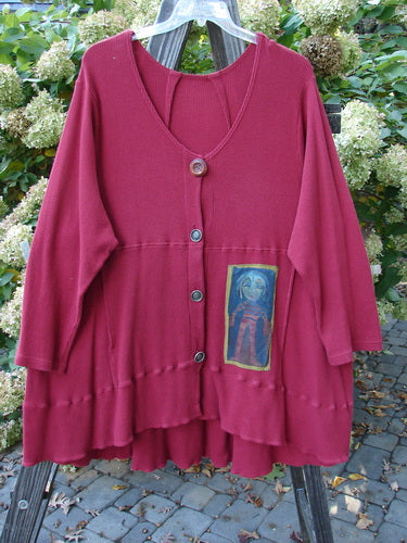 Barclay Patched Thermal Touring Cardigan in Ruby Red with vintage buttons, unique hem, flared V-neck, and drawcord back, featuring a kangaroo pocket and Lucky Guy theme patches.
