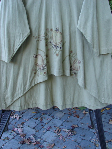 Close-up of the 1998 Botanicals Bell Flower Top Root Berry Seed Size 2, showcasing its A-line shape, scooped front hem, rounded neckline, and sectional panels.