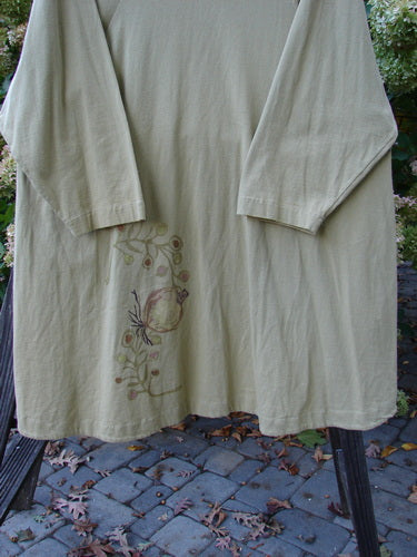 1998 Botanicals Bell Flower Top Root Berry Seed Size 2 on a rack, featuring a belled A-line shape, upward scooped front hem, sectional panels, and blue fish patch on the back.