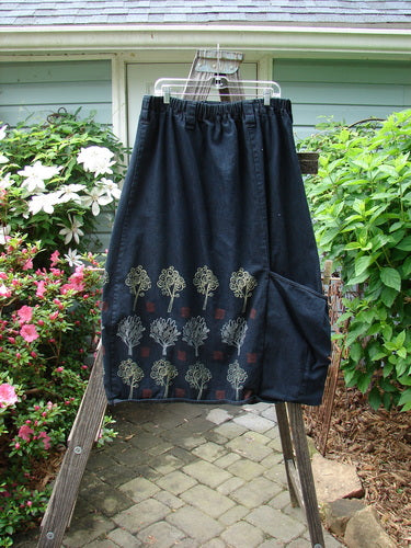 Barclay Heavy Weight Denim Belted Pocket Skirt Tree Black Indigo Size 2 displayed on a rack, showcasing its full thicker elastic waistline with belt loops and an oversized lower front side wrap pocket.