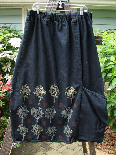 Barclay Heavy Weight Denim Belted Pocket Skirt Tree Black Indigo Size 2 featuring oversized front pocket, vertical panels, and forest-themed design.