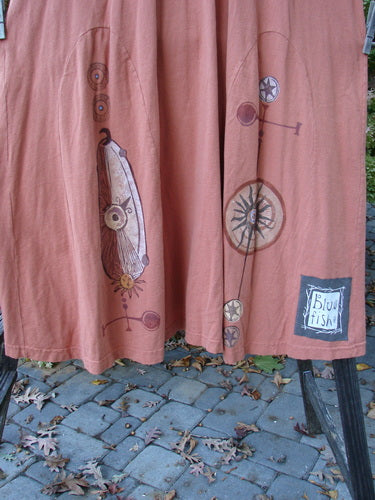 1998 4 Elements Tress Dress Starburst Arausio Size 2, close-up showing the A-line shape, front pockets, and elongating skirt insets with a scooped neckline and Blue Fish patch.