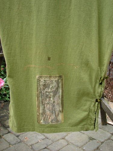 1993 Tie Jumper Mythical Goddess Olive Size 2 features thicker straps, velvet ribbon ties, empire waist, deep arm openings, painted hem, and mythical goddess theme.