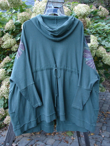 Barclay Fleece Hooded Zip Jacket Giant Daisy Pond Moss OSFA displayed on a rack, showcasing its generous hood, full zipper front, and roomy drop pockets with Celtic Moss accents.