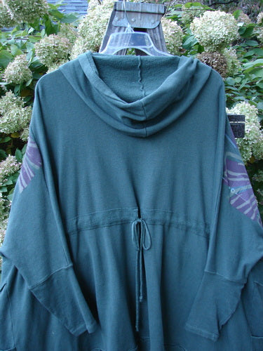 Barclay Hooded Zip Jacket with Giant Daisy theme and Celtic Moss accents, displayed on a hanger. The jacket features a cozy hood, full zipper, roomy pockets, and distinct whip stitching, showcasing its unique design.