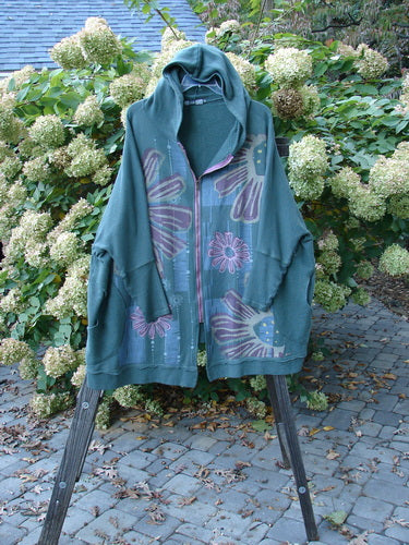 Barclay Fleece Hooded Zip Jacket with Giant Daisy theme, displayed on a stand, featuring Celtic Moss pocket accents and raw edges.