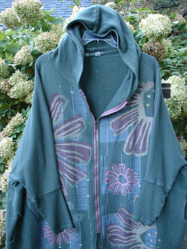Barclay Fleece Hooded Zip Jacket Giant Daisy Pond Moss OSFA featuring a cozy hood, full zipper front, Celtic Moss pocket accents, and metallic daisy theme paint with raw edge details and exterior whip stitching.