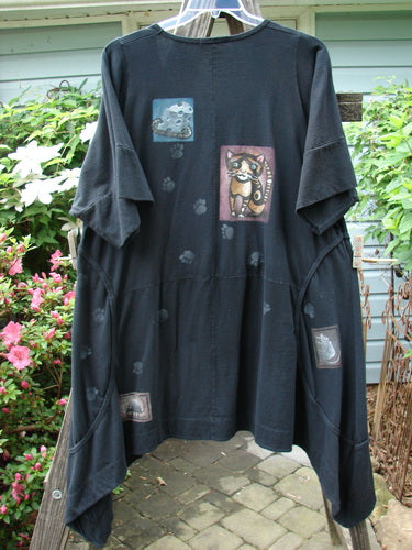 Barclay Double Pocket Bounce Tunic Dress Cat & Mouse Black Size 2 featuring pictures of a cat and paw prints, oversized front pockets, curved seams, and a scooped hemline.