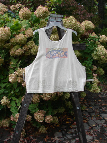 1999 Crop Tank Top Goldfish Dust Size 2 displayed on a wooden stand, showcasing a colorful goldfish theme with a scooped neckline and Blue Fish patch.