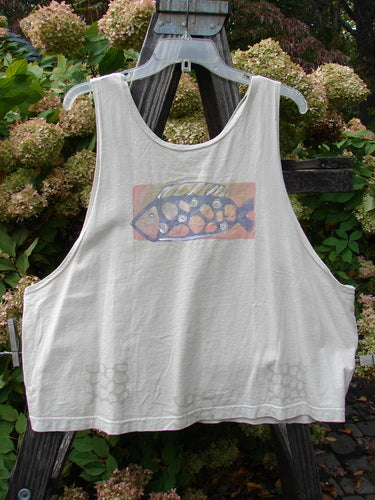 1999 Crop Tank Top Goldfish Dust Size 2. White tank top featuring a colorful goldfish design, wide boxy shape, scooped neckline, and signature blue fish patch, perfect for hot summer days.