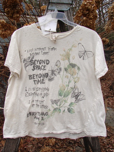 Magnolia Pearl NWT Cotton Jersey Boyfriend Tee Beyond Butterflies True OSFA features inspirational phrases and a botanical motif, with a drapey fit and distressed details, displayed on a wooden ladder.