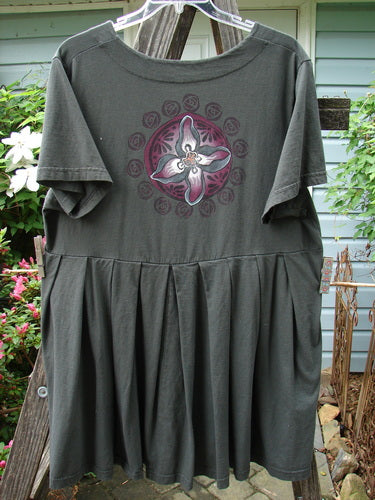 Barclay Boxcar Dress Rear Orchid Raven Size 2: Grey shirt with floral design, squared neckline, empire waist, full pleats, and lower flair; made of medium-weight cotton jersey from BlueFishFinder.com.