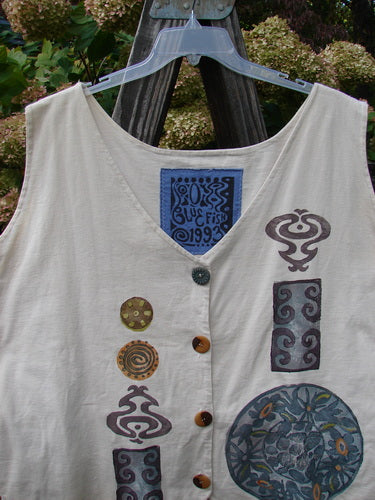 1993 The Vest Medallion Tea Dye Size 2, featuring a blue label, original Blue Fish buttons, tuxedo front tails, rounded rear hem, and draw-corded back with metal grommets in festive medallion theme.